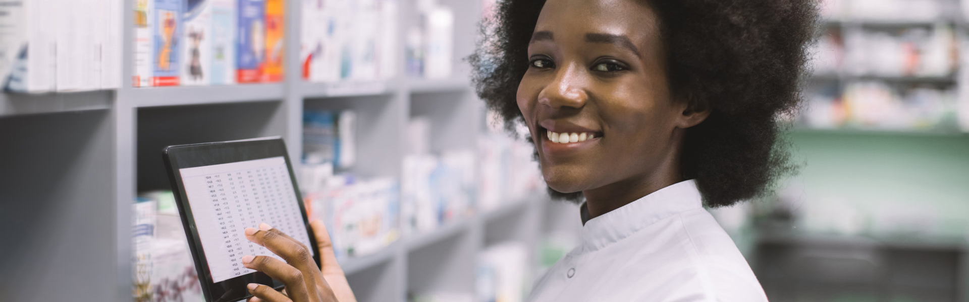 pharmacist holding a tablet