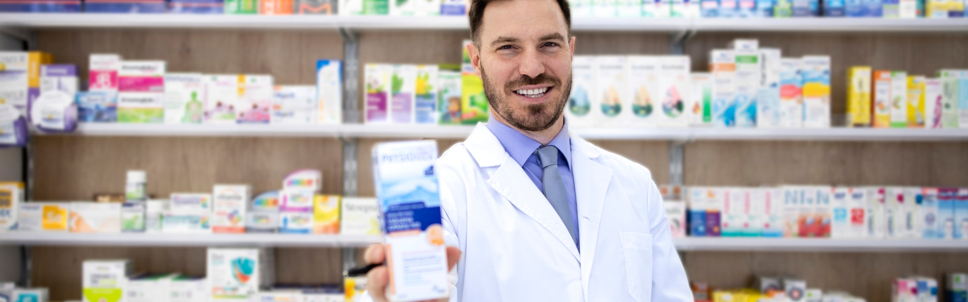 pharmacist holding a medicine